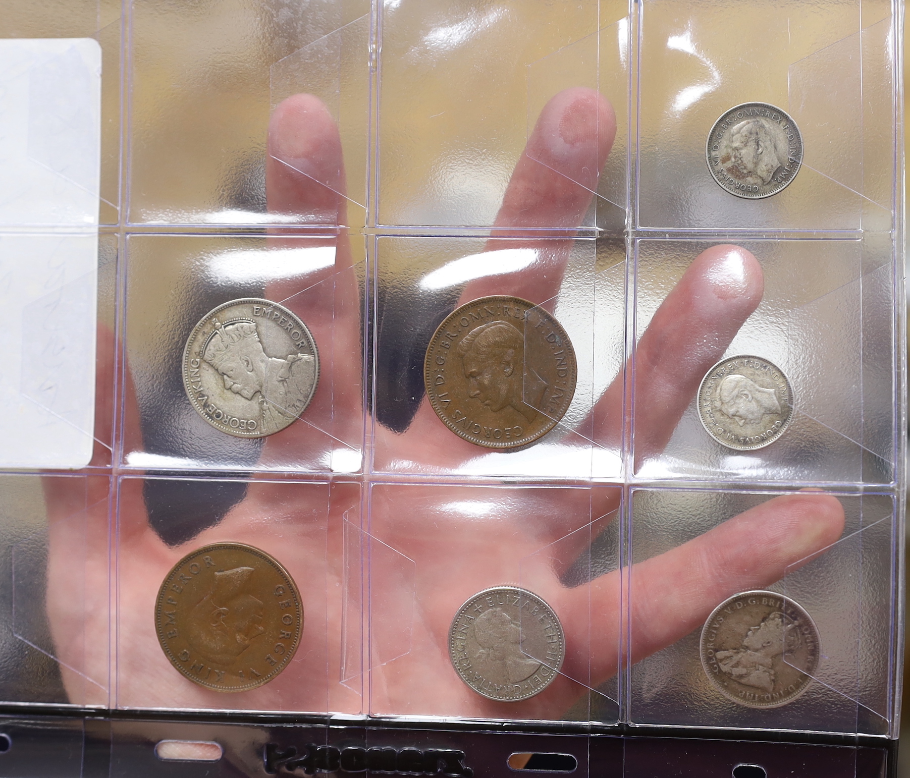 A collection of British Commonwealth and World coins together with 19th/20th century banknotes including China